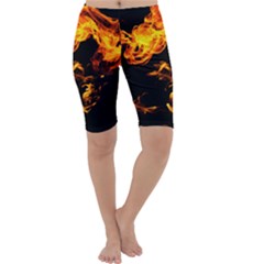 Can Walk On Fire, Black Background Cropped Leggings  by picsaspassion