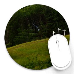 Three Crosses On A Hill Round Mousepads by trendistuff